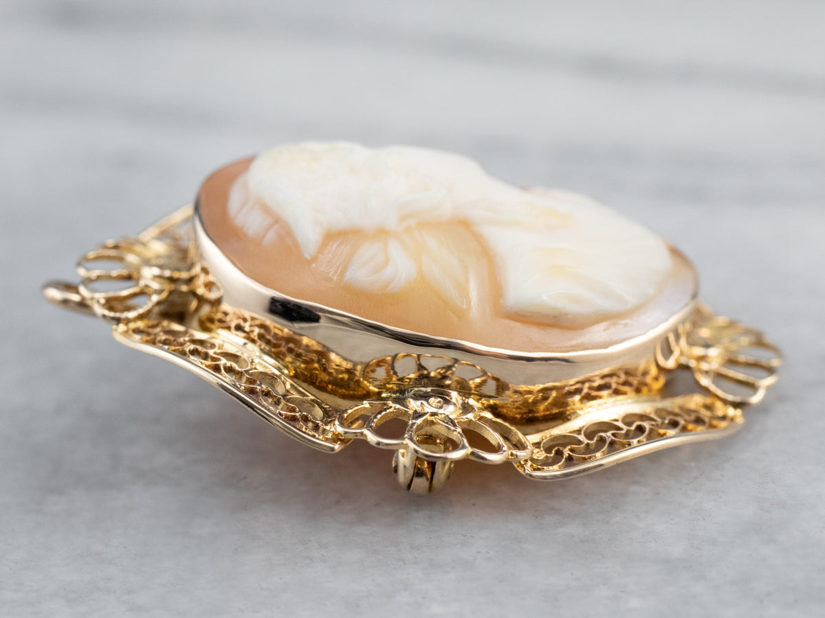 Broche o colgante de cameo de filigrana de oro vintage
