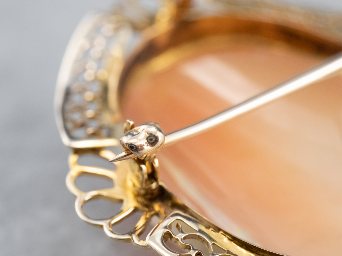 Broche o colgante de cameo de filigrana de oro vintage