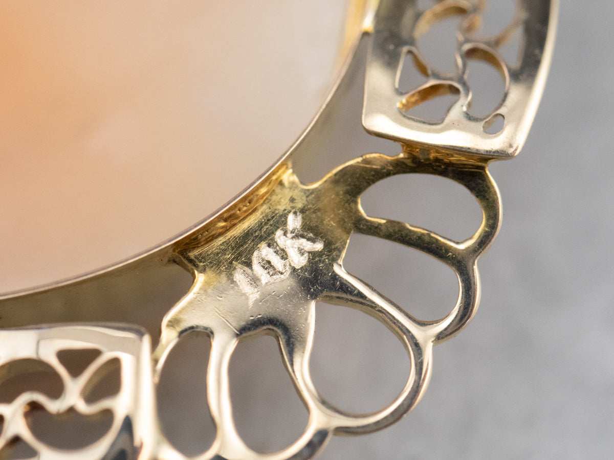 Broche o colgante de cameo de filigrana de oro vintage