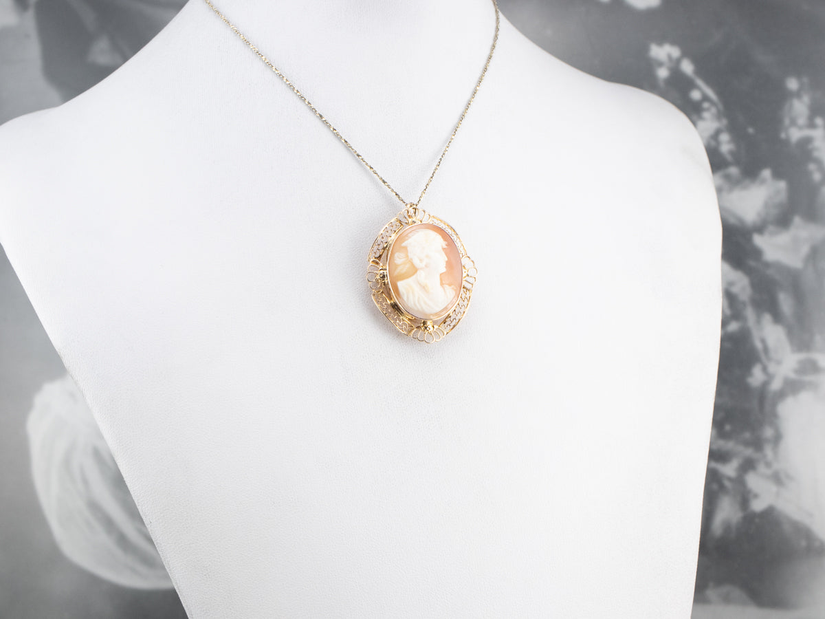 Broche o colgante de cameo de filigrana de oro vintage
