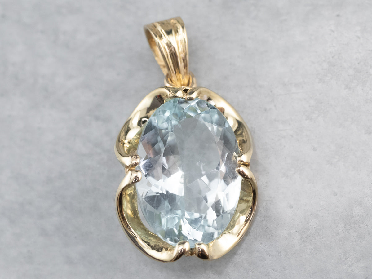 Gold Blue Topaz Solitaire Pendant
