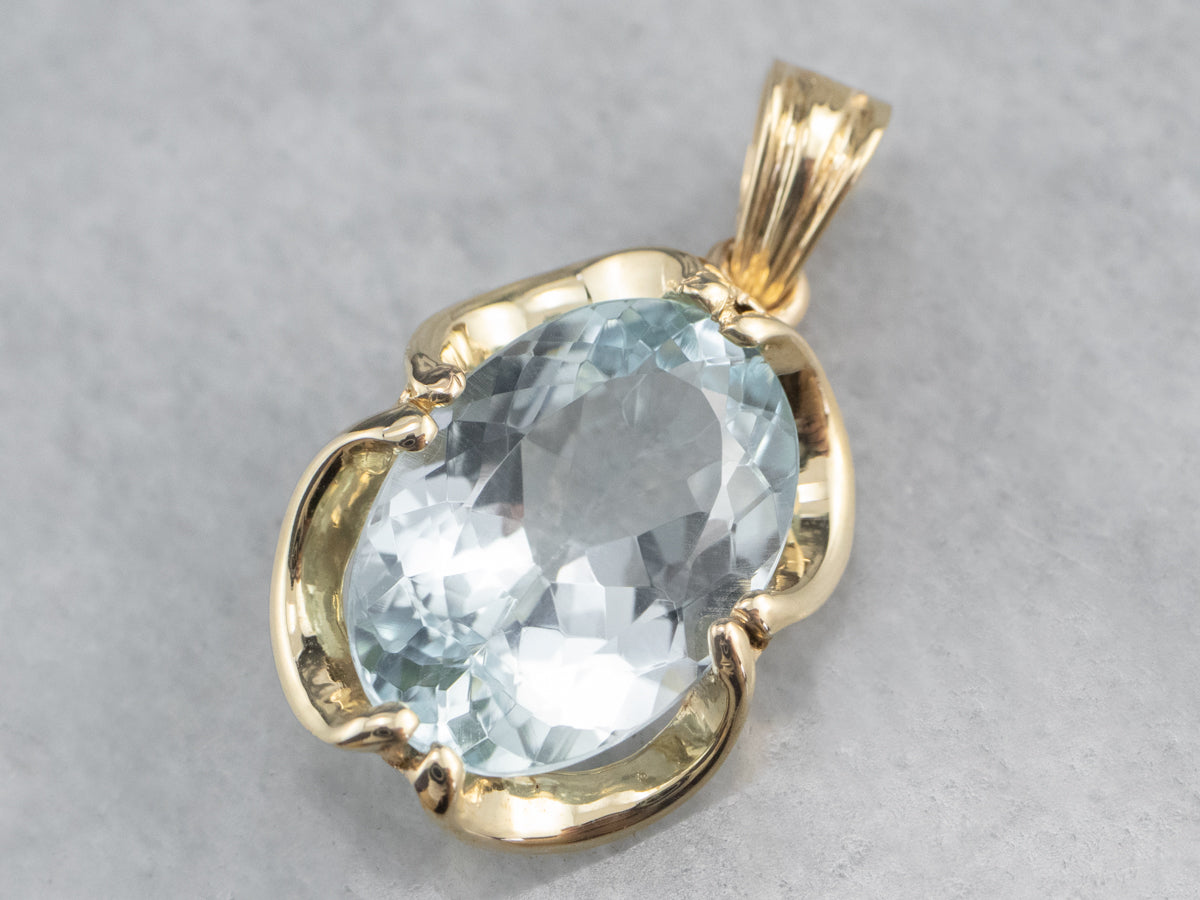 Gold Blue Topaz Solitaire Pendant