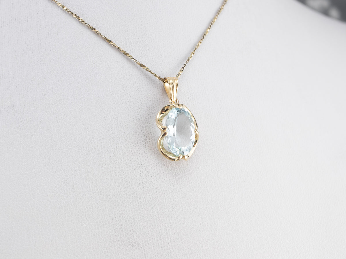 Gold Blue Topaz Solitaire Pendant