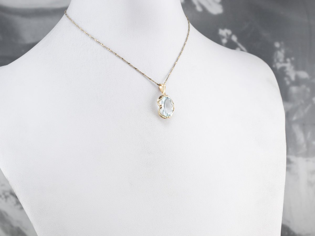 Gold Blue Topaz Solitaire Pendant