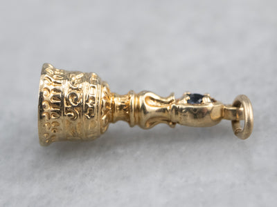 Sapphire Ornate Hand Bell Charm