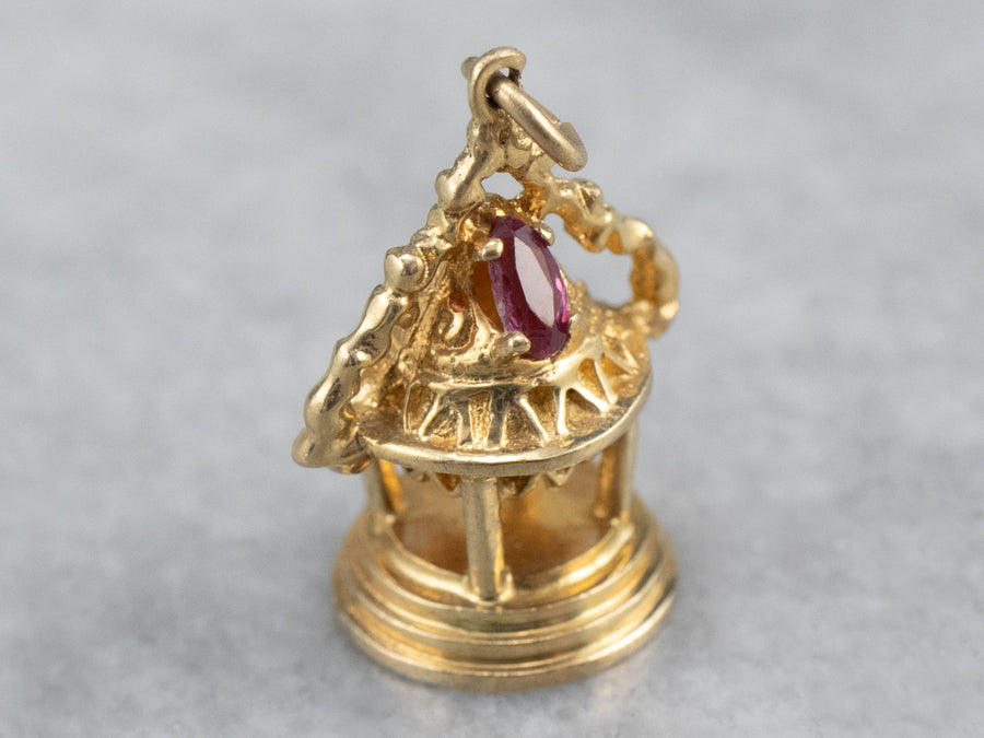 Ornate Gold and Ruby Temple Charm