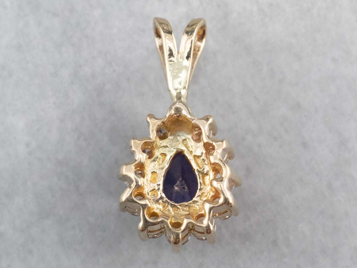 Colgante con halo de diamantes y zafiro morado