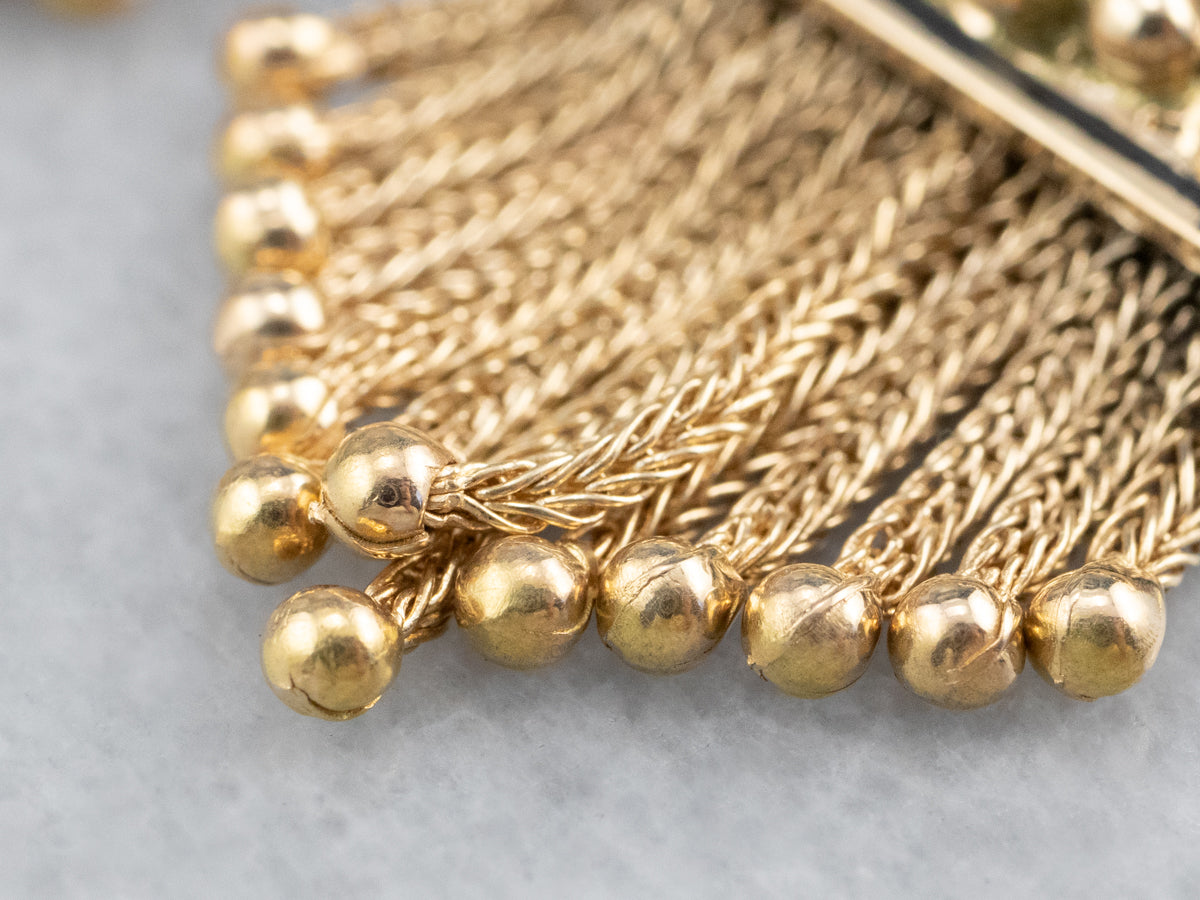 Pendientes llamativos con flecos dorados del estilo victoriano