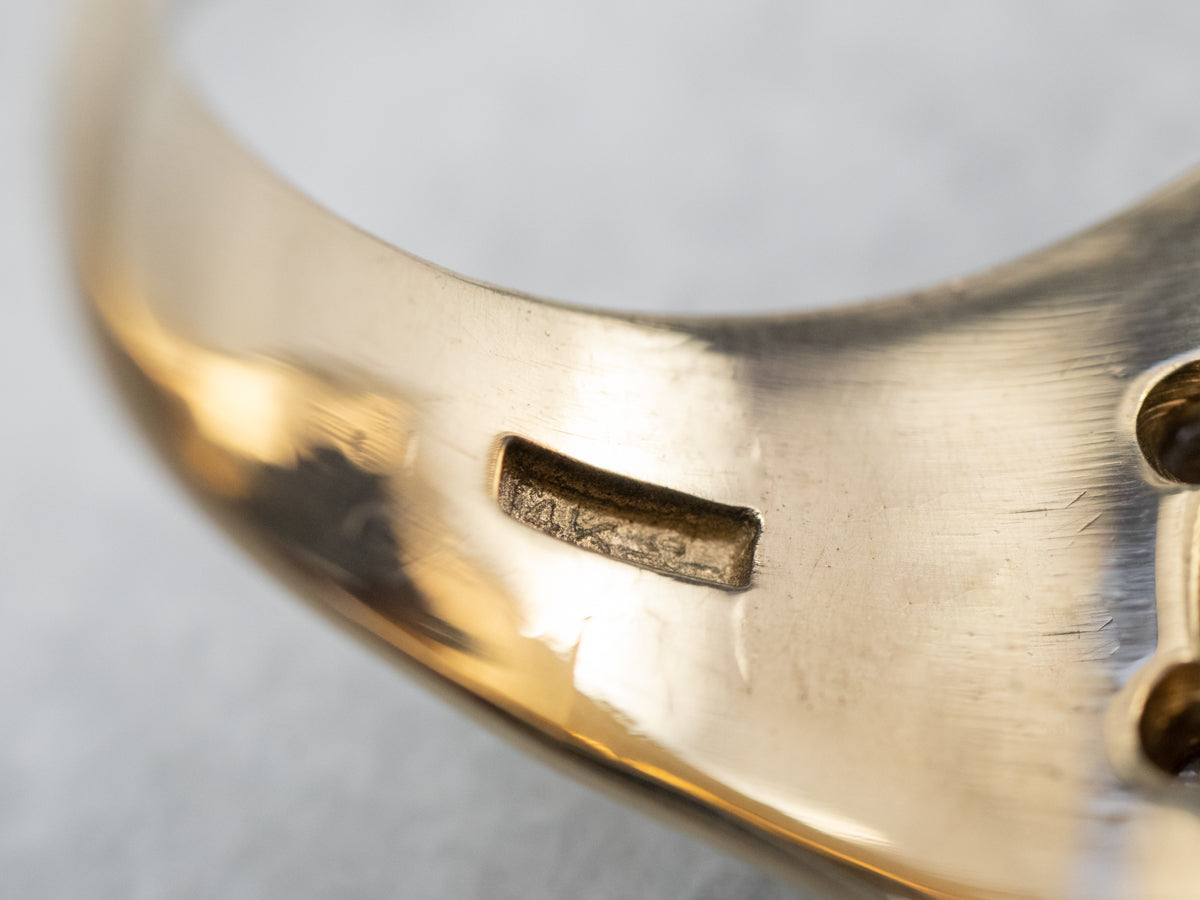 Anillo retro de oro con diamantes y ónix negro