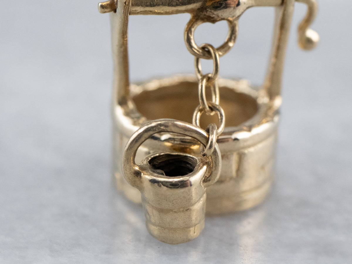 14K Gold Moving Water Well Charm