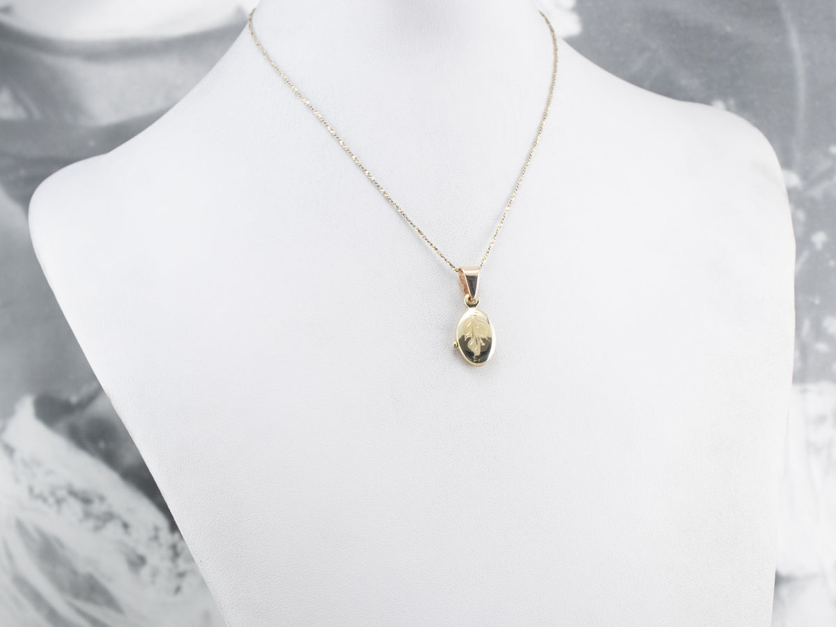 Engraved Gold Botanical Locket