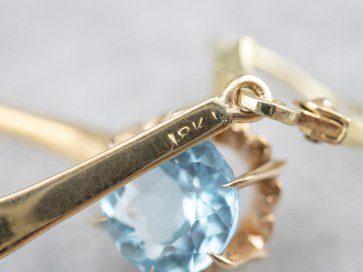 Pendientes colgantes de topacio azul dorado