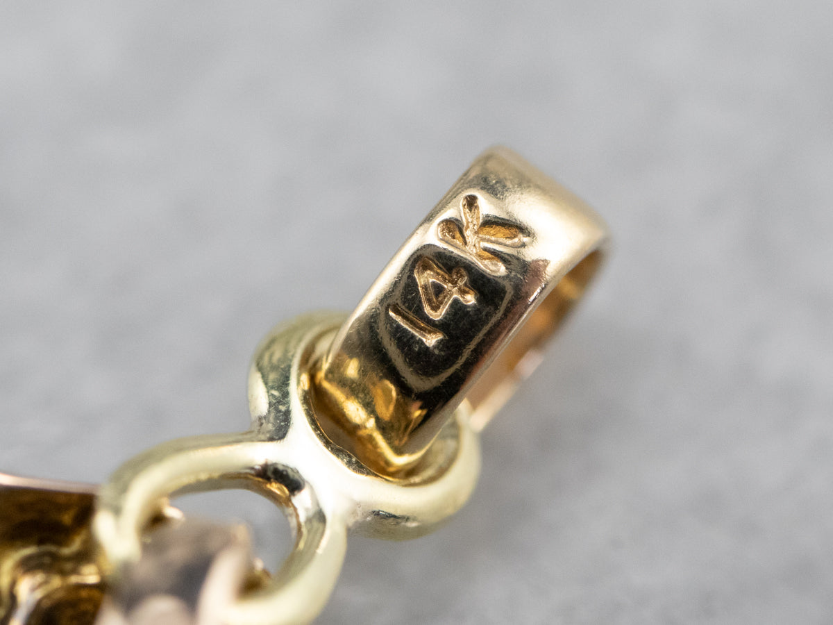 Gold Ruby Lover's Knot Pendant