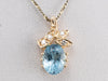 Gold Blue Topaz and Diamond Pendant