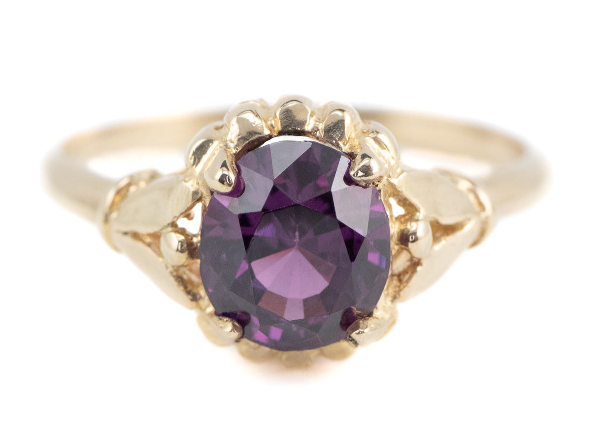 Abigail Purple Sapphire Gold Solitaire Ring from the Elizabeth Henry Collection