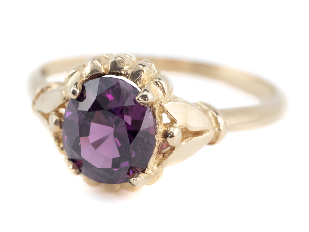 Abigail Purple Sapphire Gold Solitaire Ring from the Elizabeth Henry Collection
