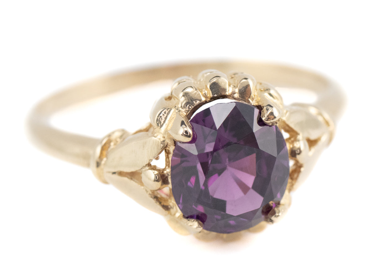 Abigail Purple Sapphire Gold Solitaire Ring from the Elizabeth Henry Collection