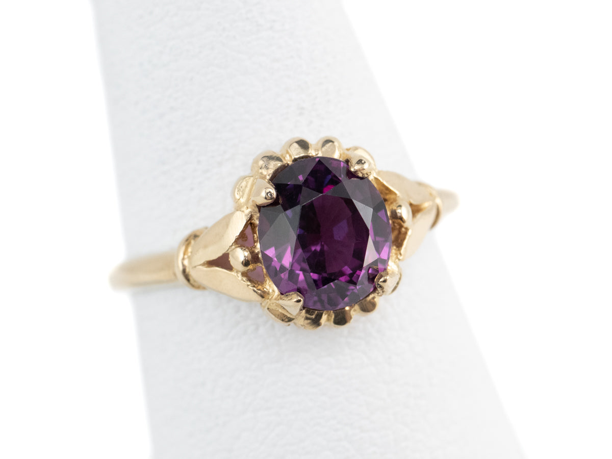 Abigail Purple Sapphire Gold Solitaire Ring from the Elizabeth Henry Collection