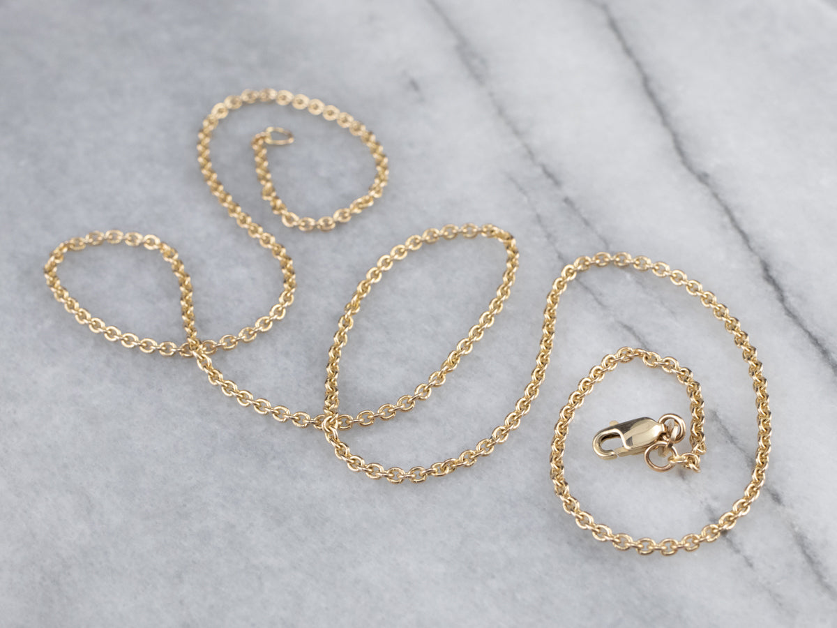 Cadena tipo cable de oro brillante