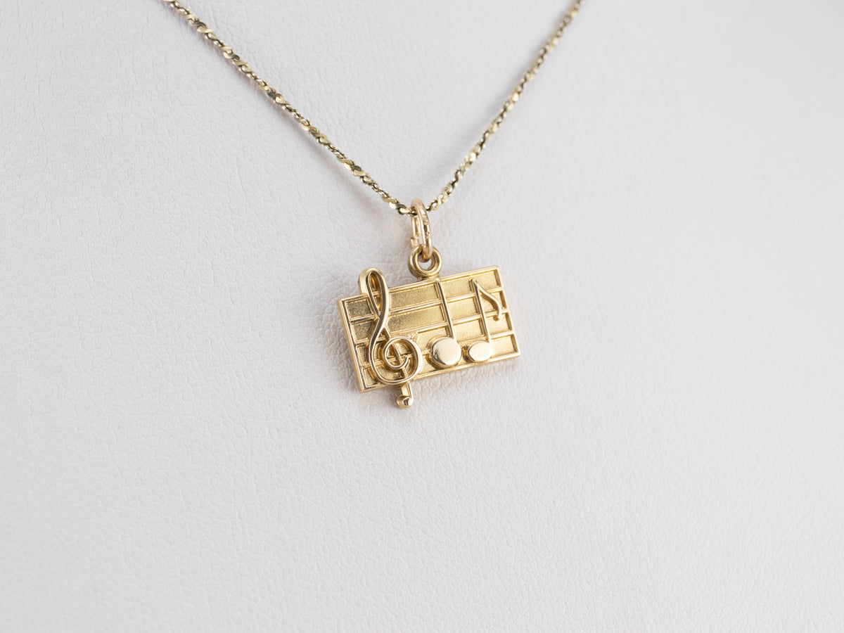 Gold Music Note Charm Pendant