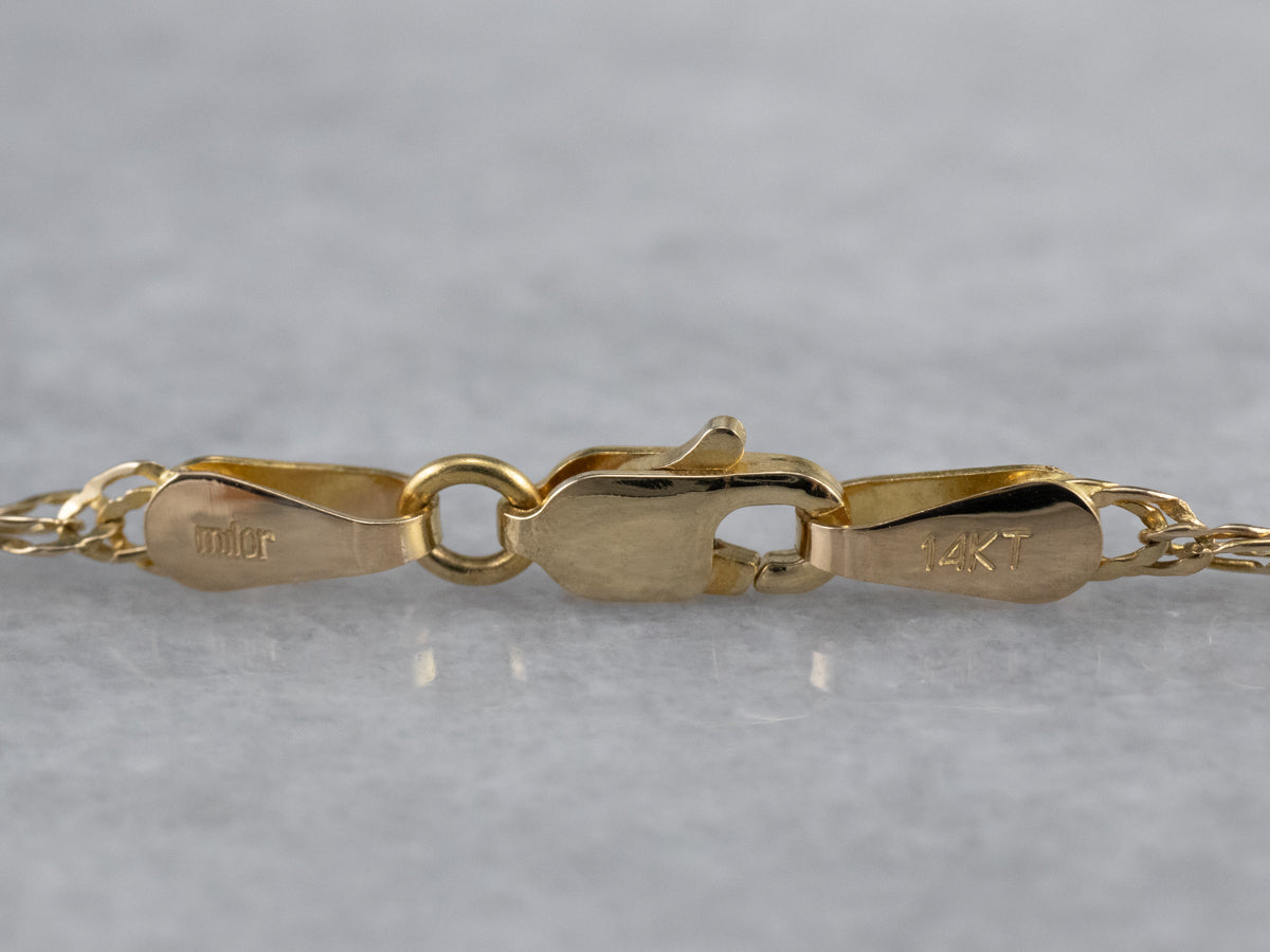 Cadena torcida larga de oro amarillo