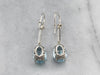 White Gold Blue Topaz and Diamond Drop Earrings