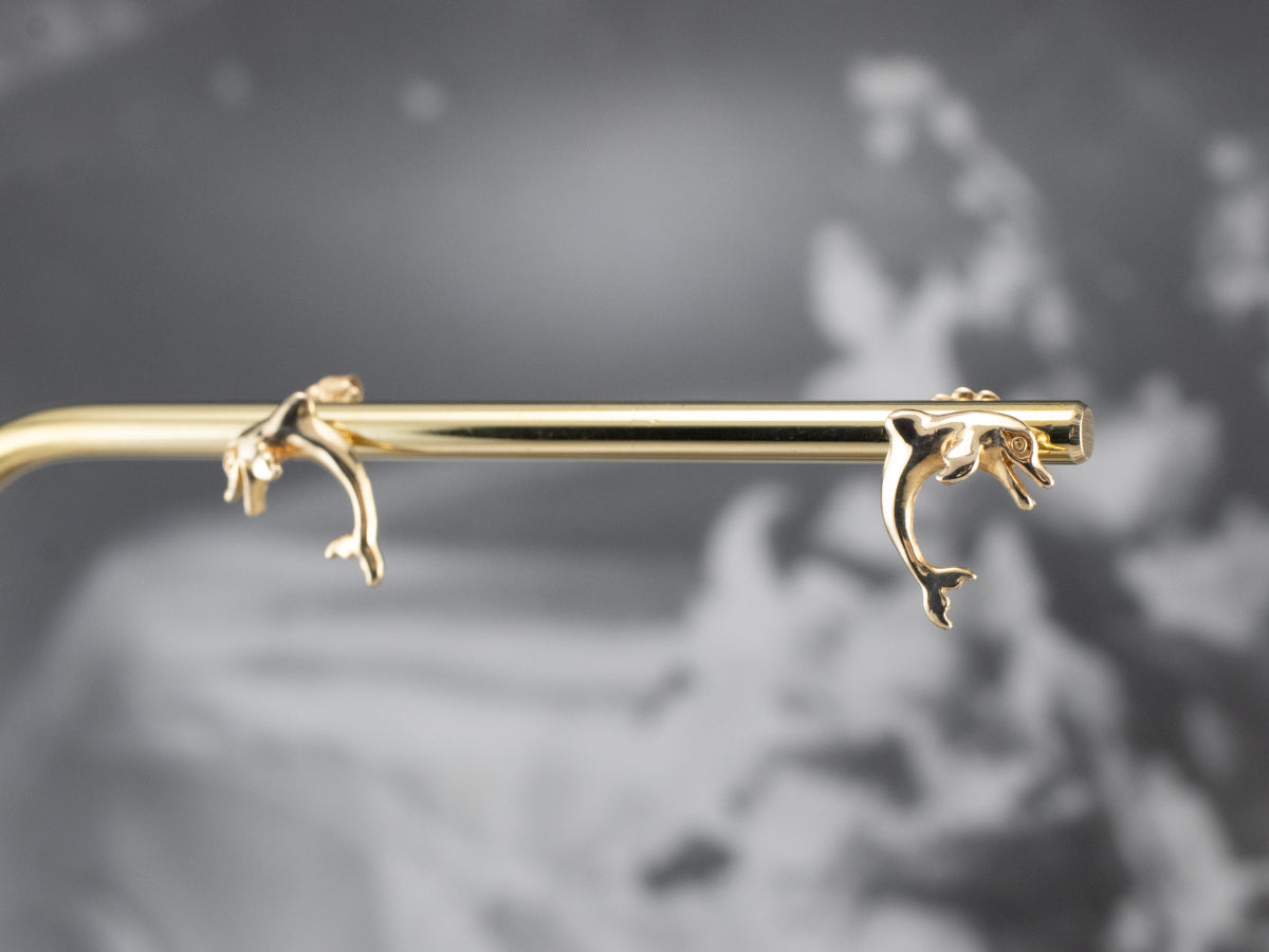 Pendientes de delfín de oro