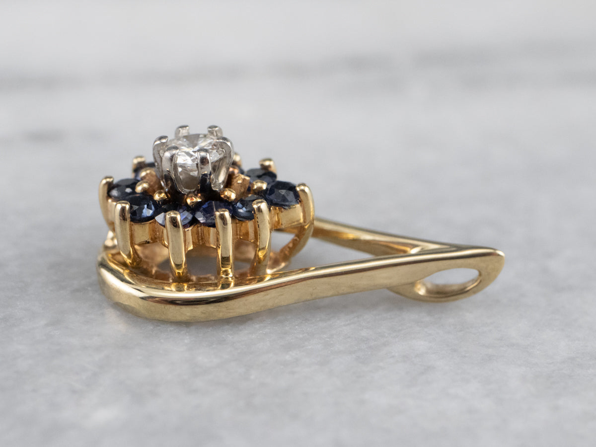 Colgante floral con halo de diamantes y zafiros