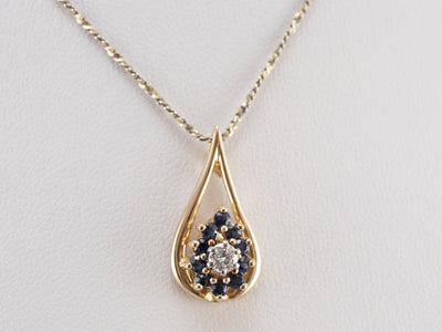 Floral Sapphire and Diamond Halo Pendant