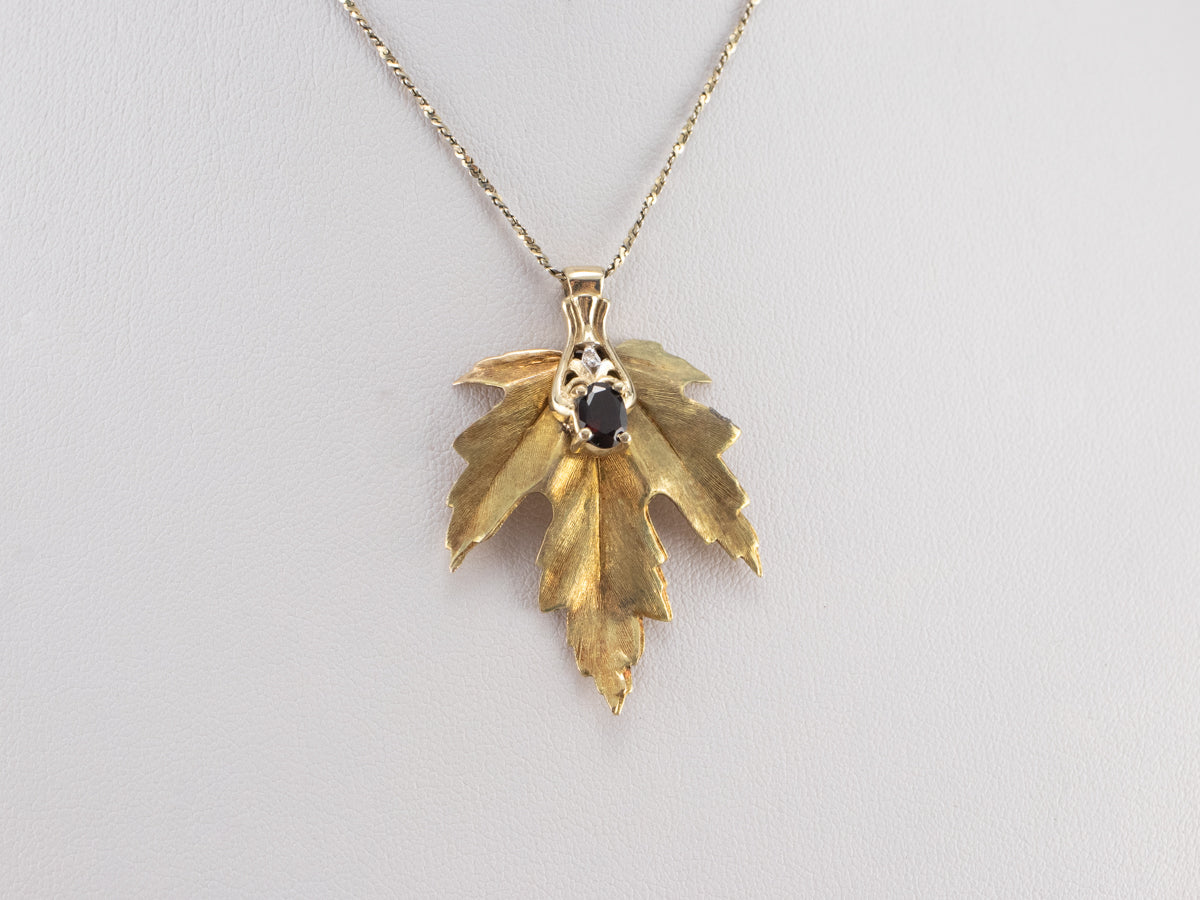 Colgante de hoja de oro granate