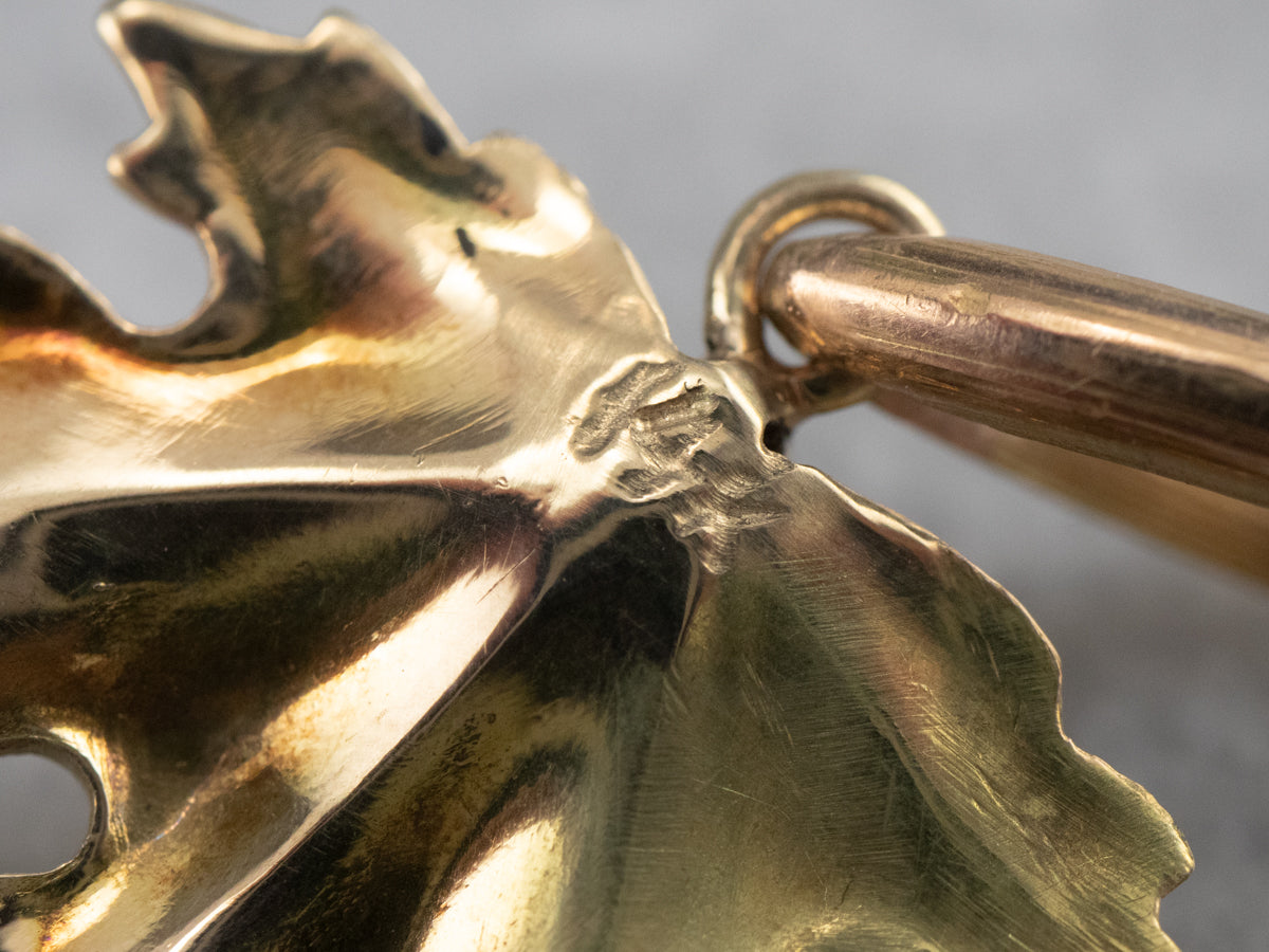 Colgante de hoja de uva de oro rubí