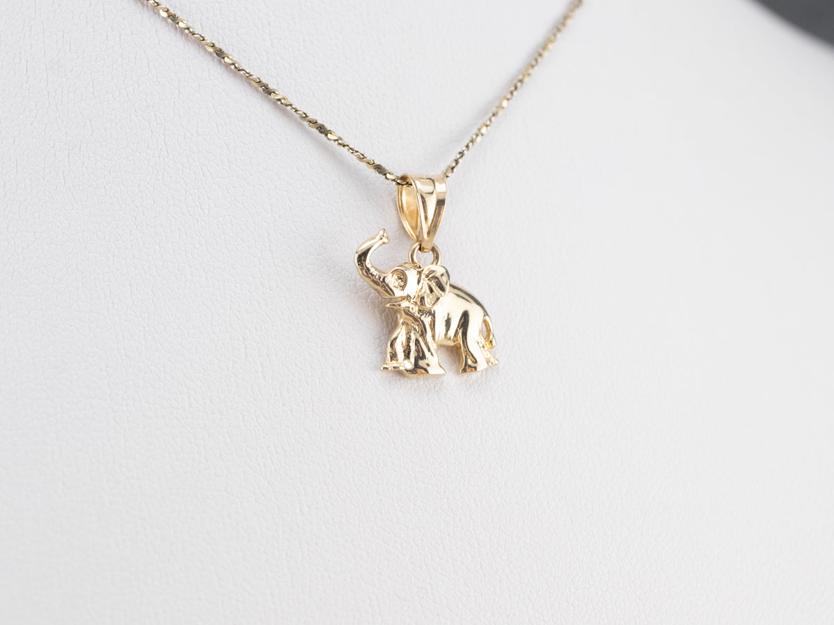 Raised Trunk Elephant Gold Pendant