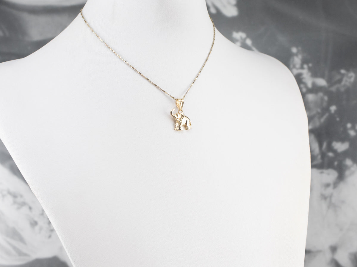 Raised Trunk Elephant Gold Pendant