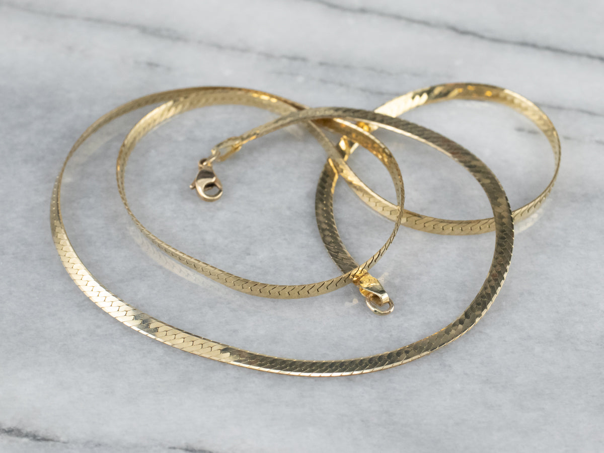 Cadena de espiga de oro de 14 quilates