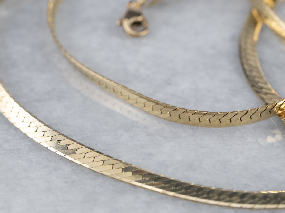 Cadena de espiga de oro de 14 quilates