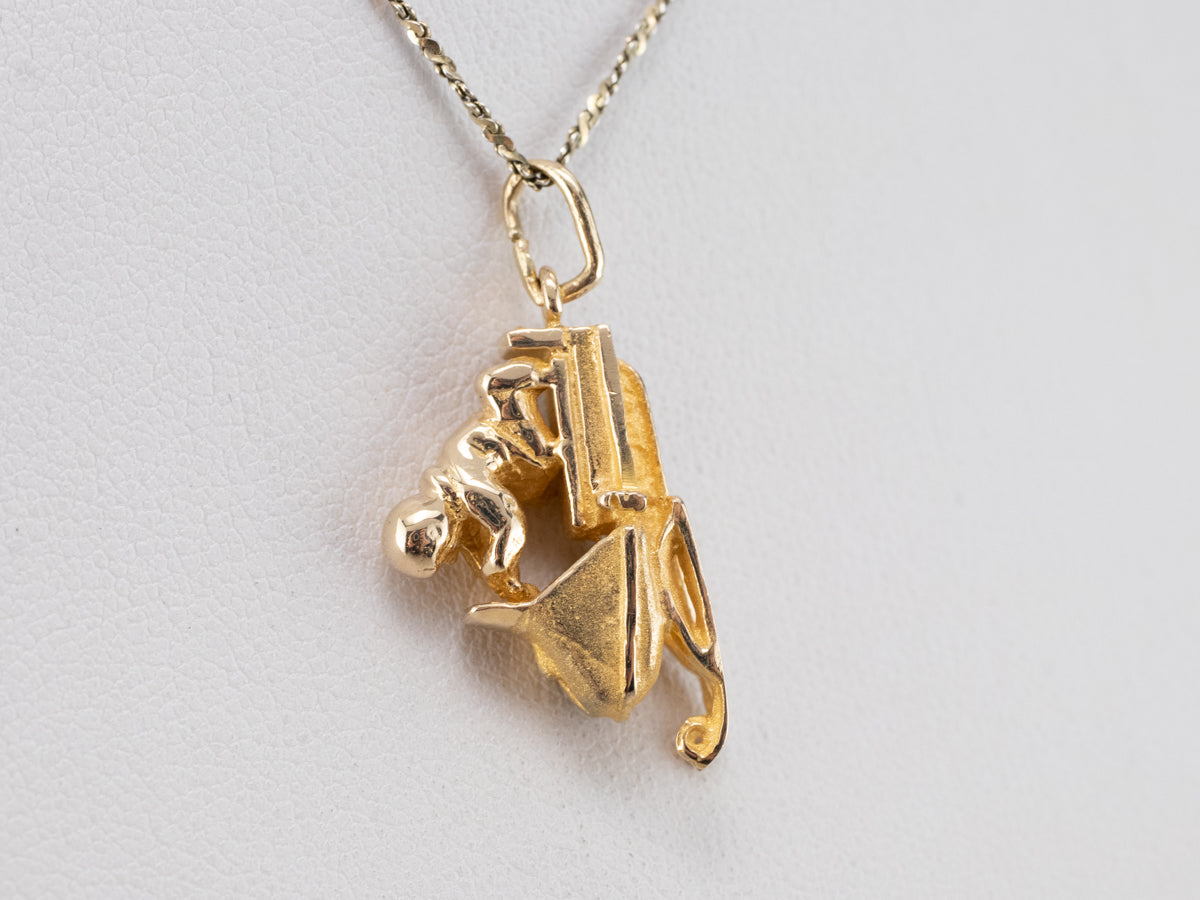 Vintage Gold Snowmobile Charm