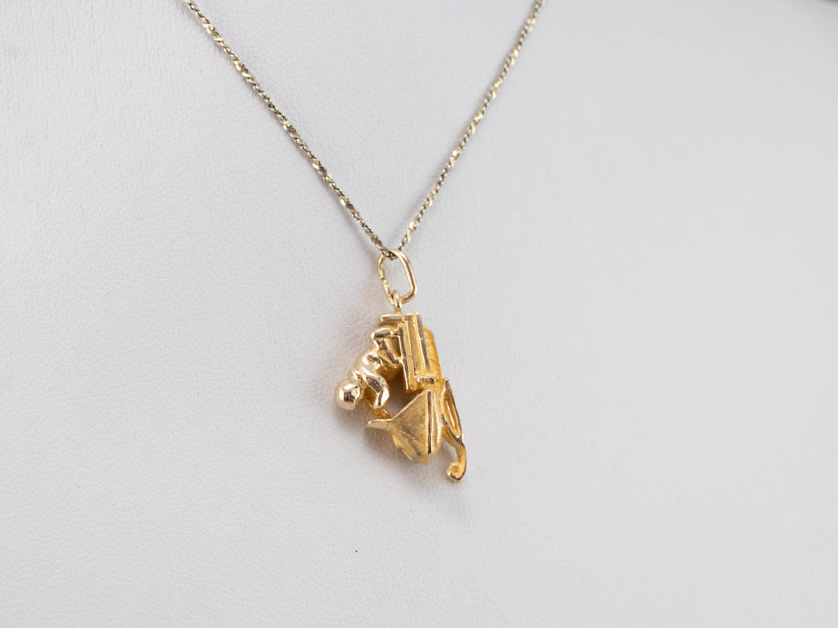 Vintage Gold Snowmobile Charm