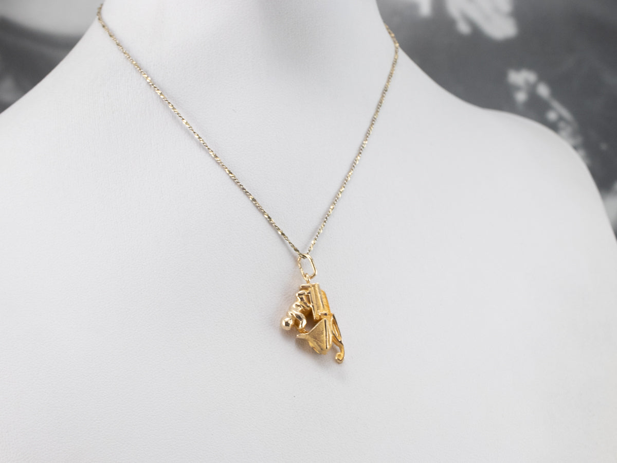 Vintage Gold Snowmobile Charm