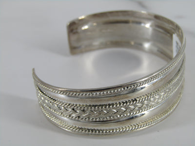 Wide Sterling Silver Cuff With Rope Designs Throughout