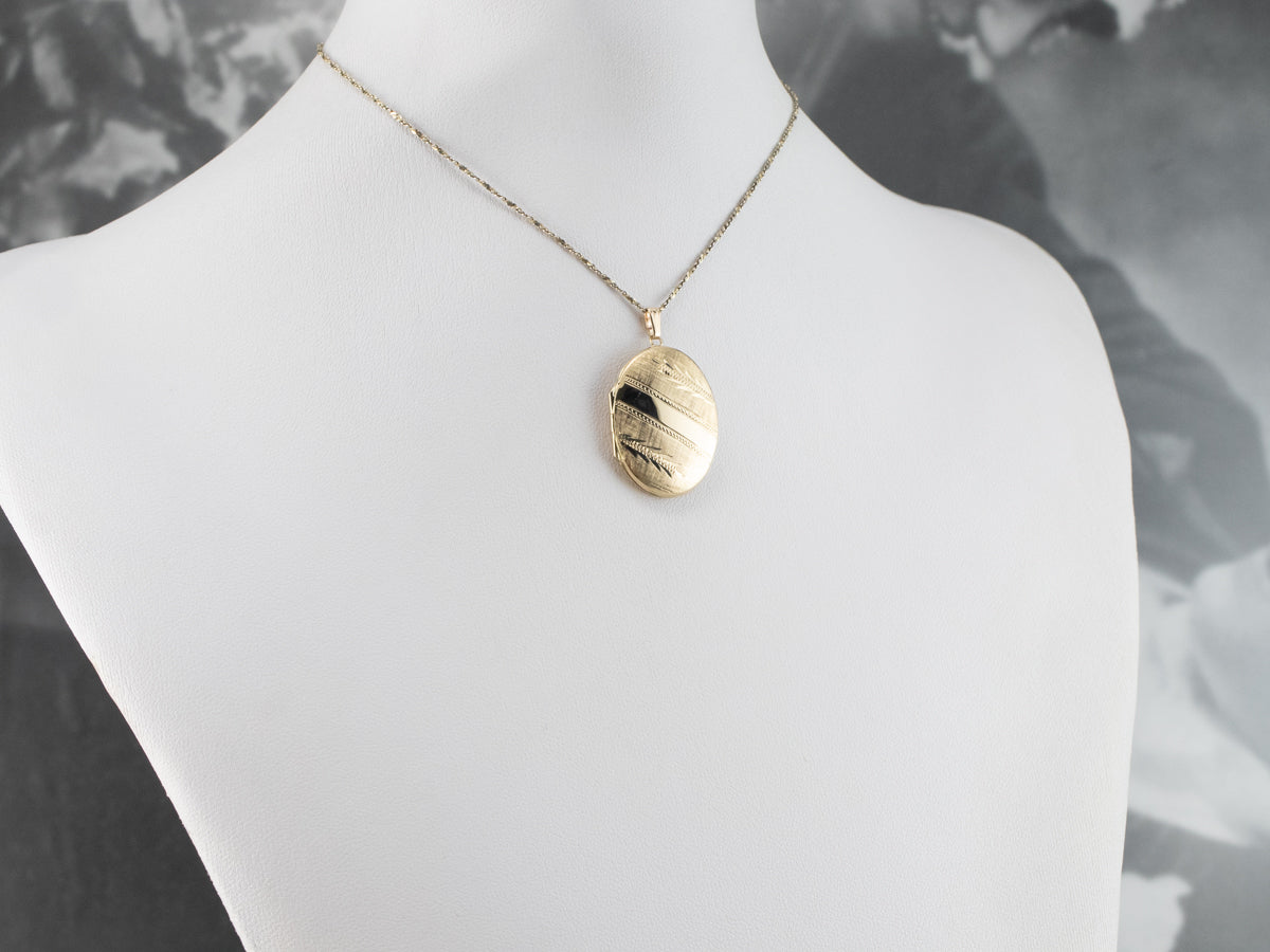 Engraved Oval Gold Locket Pendant