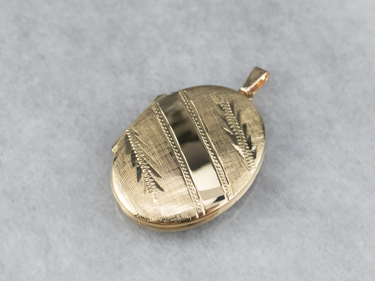 Engraved Oval Gold Locket Pendant