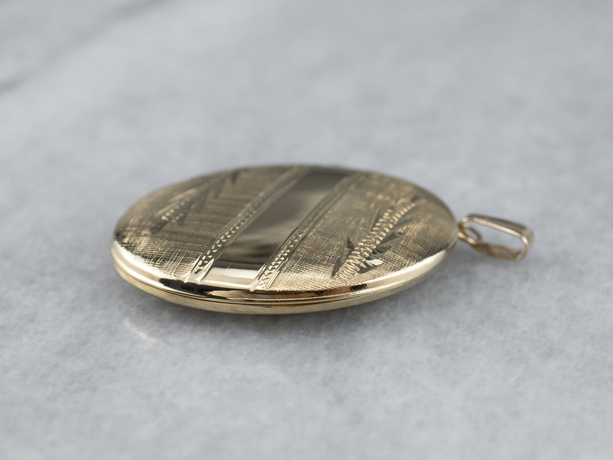 Engraved Oval Gold Locket Pendant