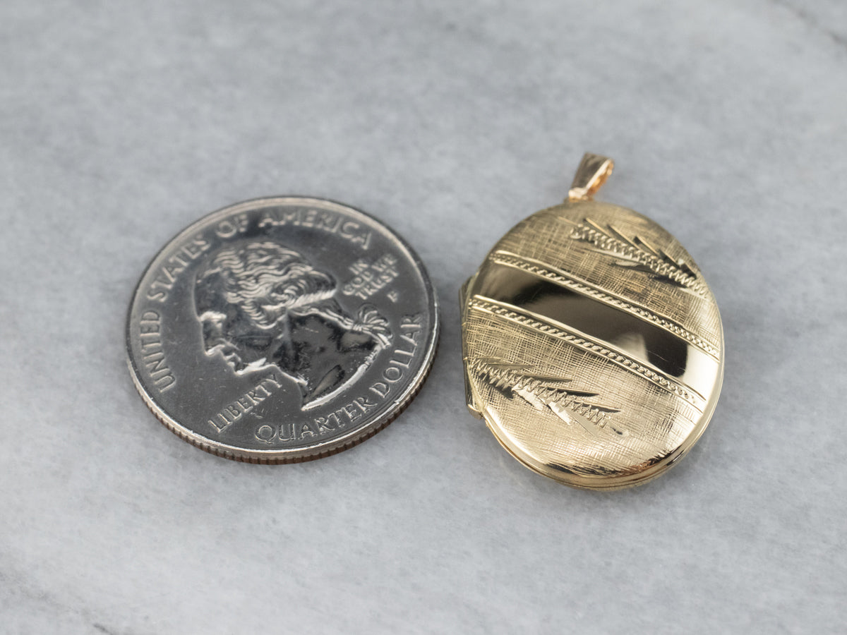 Engraved Oval Gold Locket Pendant