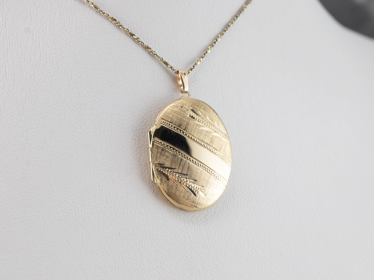 Engraved Oval Gold Locket Pendant