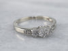 Three Diamond Halo Engagement Ring
