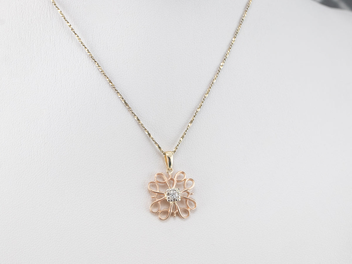 Colgante de filigrana de oro tricolor con diamantes