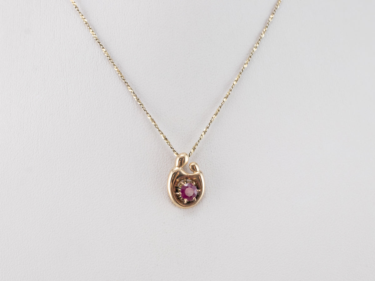 Ruby and Gold Mother and Child Pendant