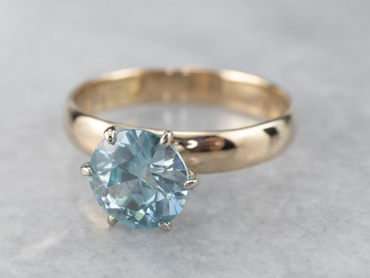 Blue Zircon Two Tone Gold Solitaire Ring