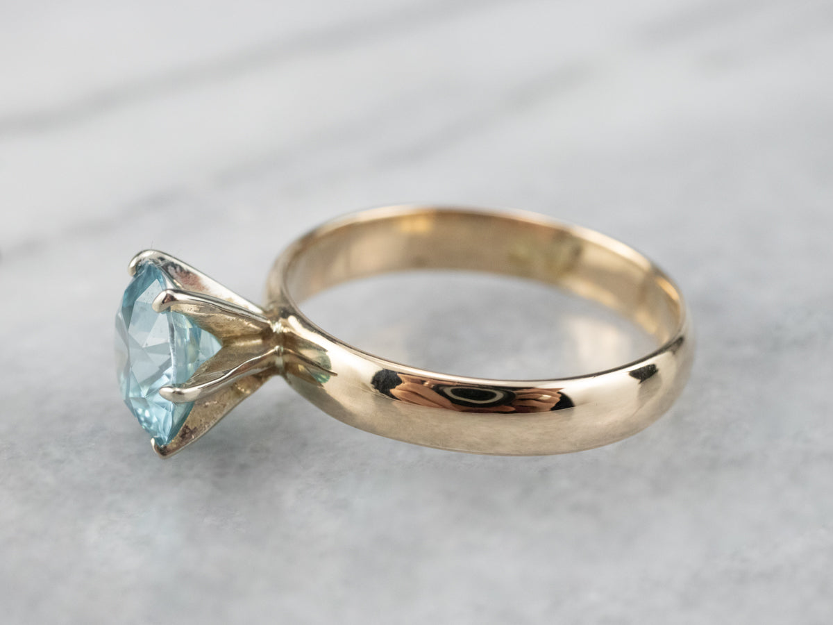 Blue Zircon Two Tone Gold Solitaire Ring