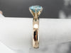 Blue Zircon Two Tone Gold Solitaire Ring